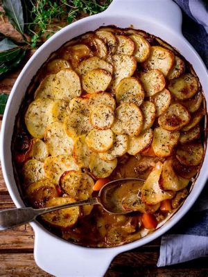  Lancashire Hotpot: ¡Un festín de carne suculenta y verduras tiernas bañadas en un delicioso caldo especiado!