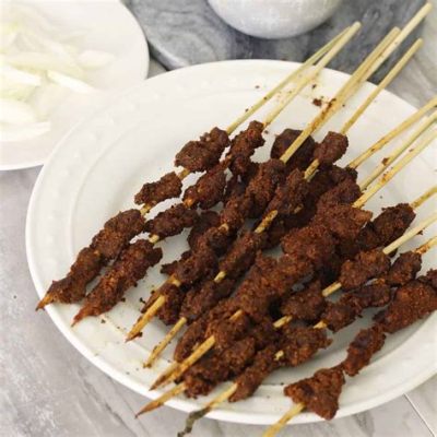  Suya: ¡Un festín de especias que te transportará a las calles bulliciosas de Festac Town!